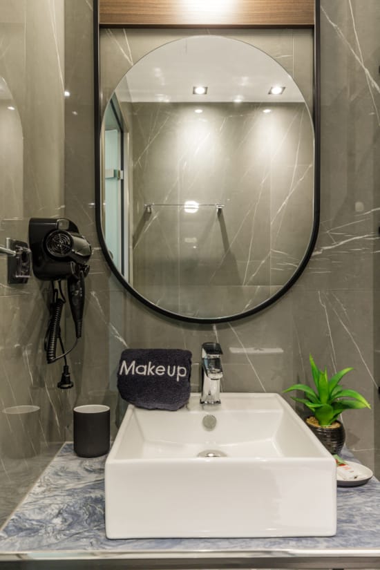 a bathroom with a large mirror