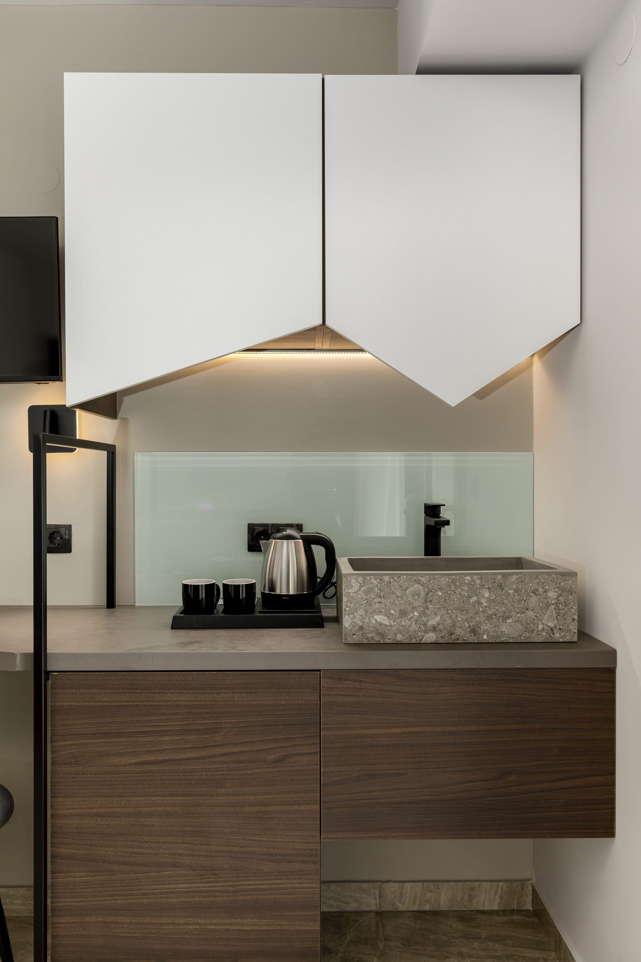 a kitchen with white cabinets