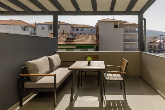 a room with a table and chairs