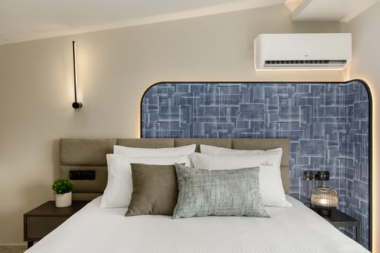 a bed with white pillows