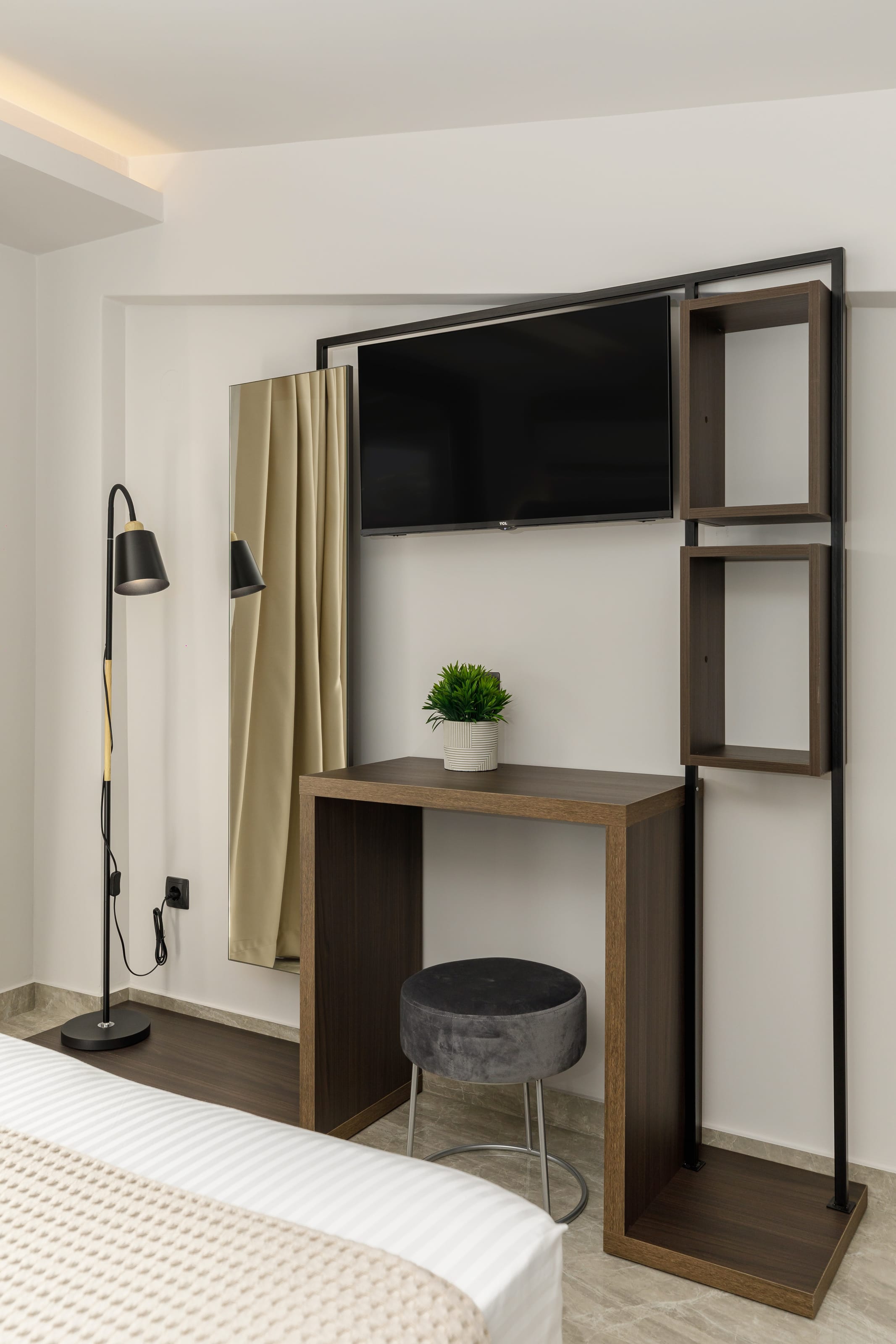 a room with a tv and a table