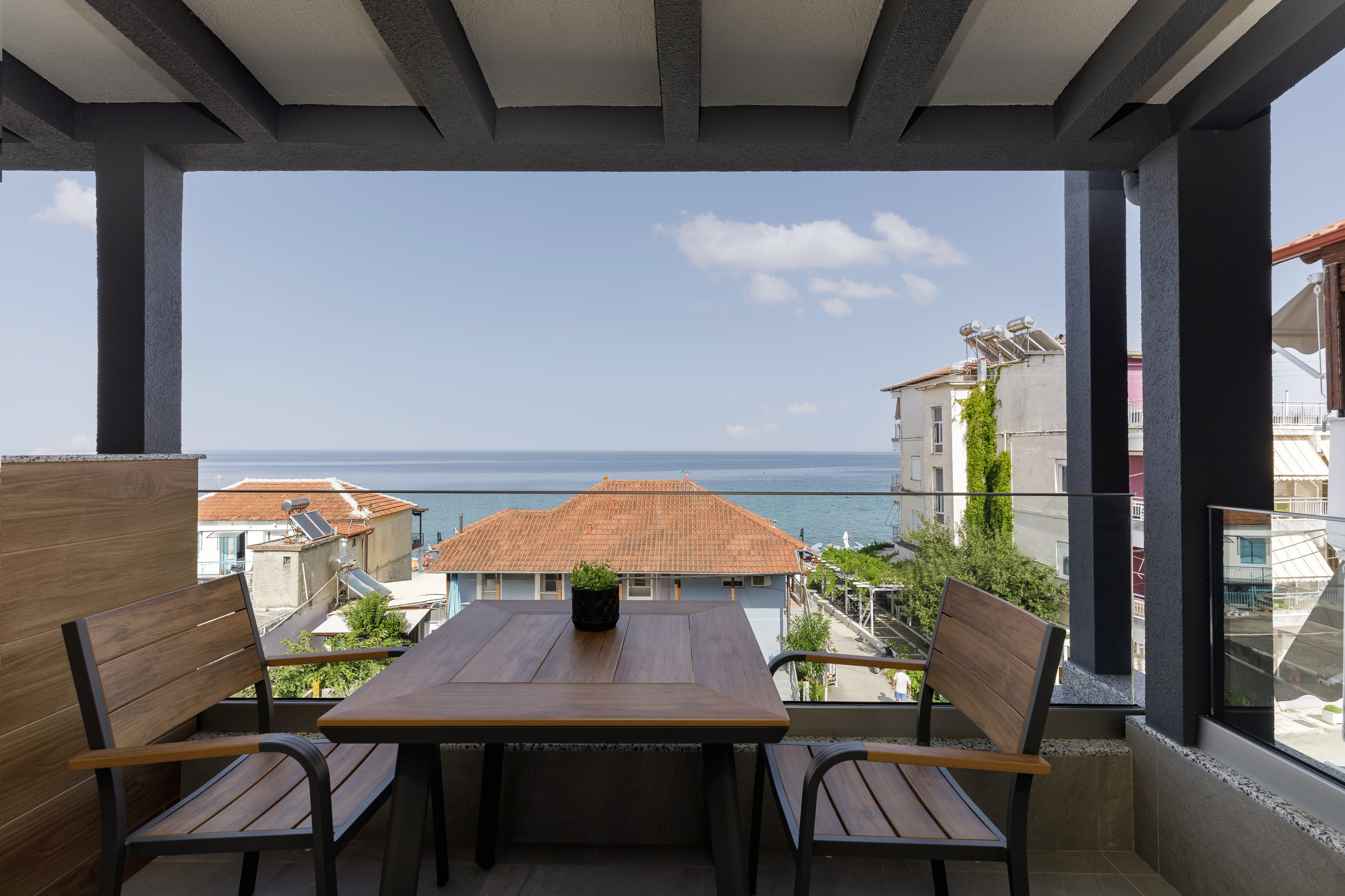 a table and chairs on a deck