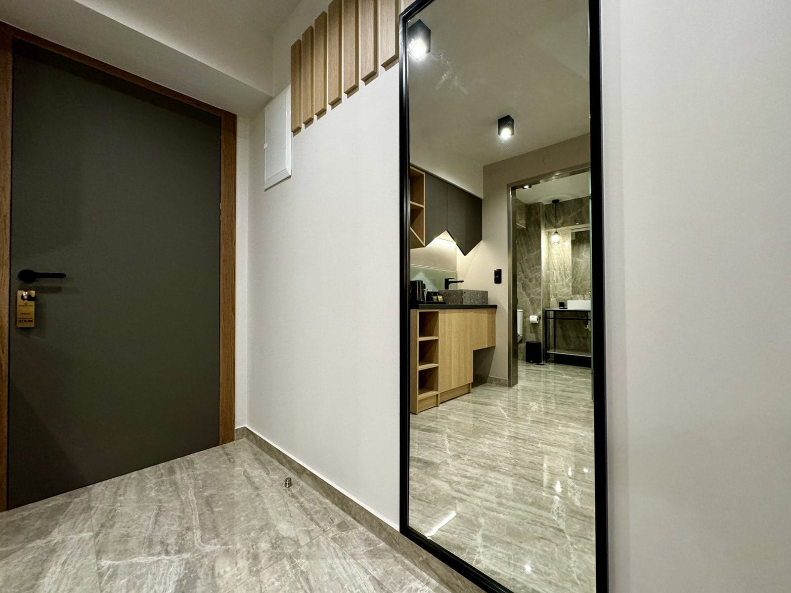 a hallway with a glass door
