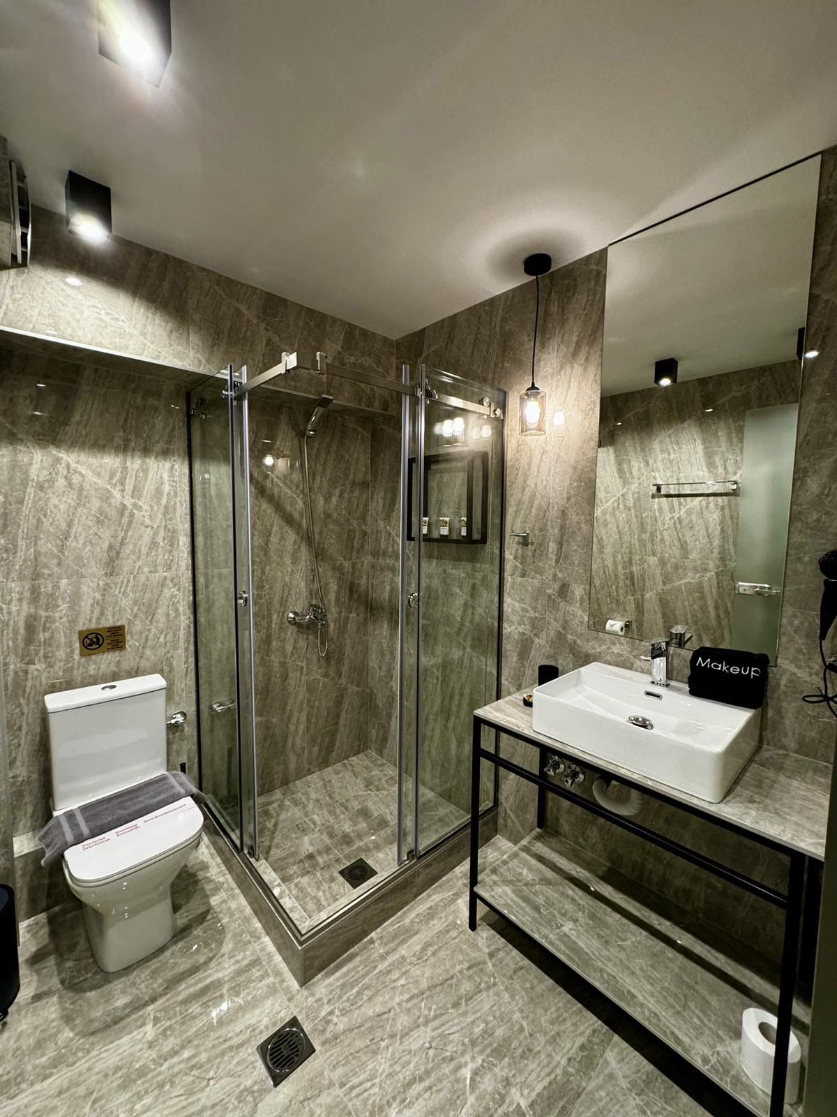 a bathroom with a glass shower