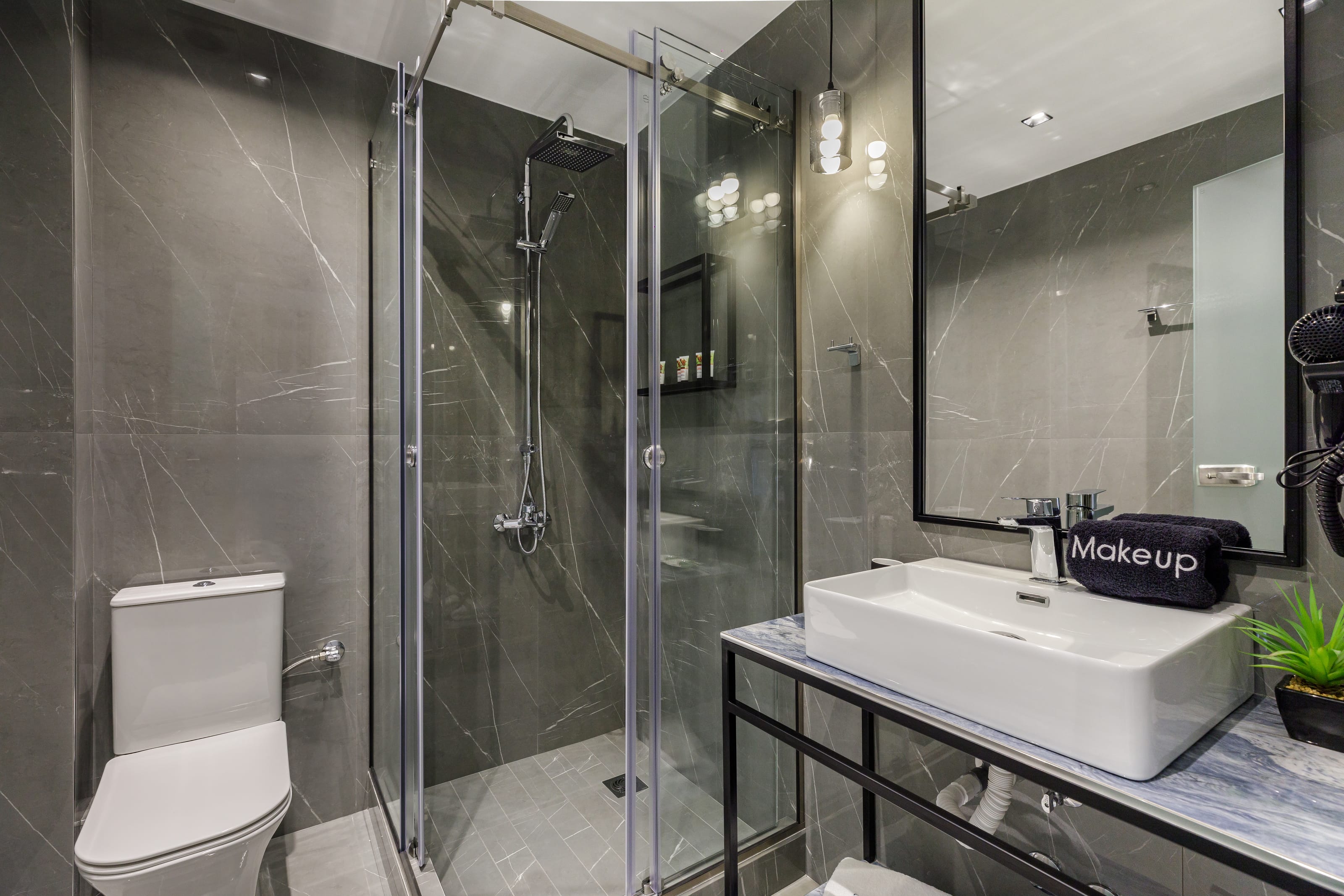 a bathroom with a glass shower