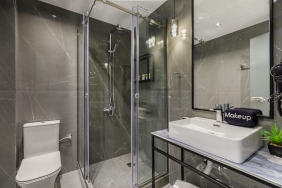 a bathroom with a glass shower