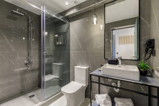 a bathroom with a glass shower