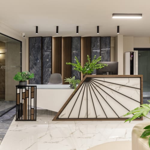 a room with a glass table and plants