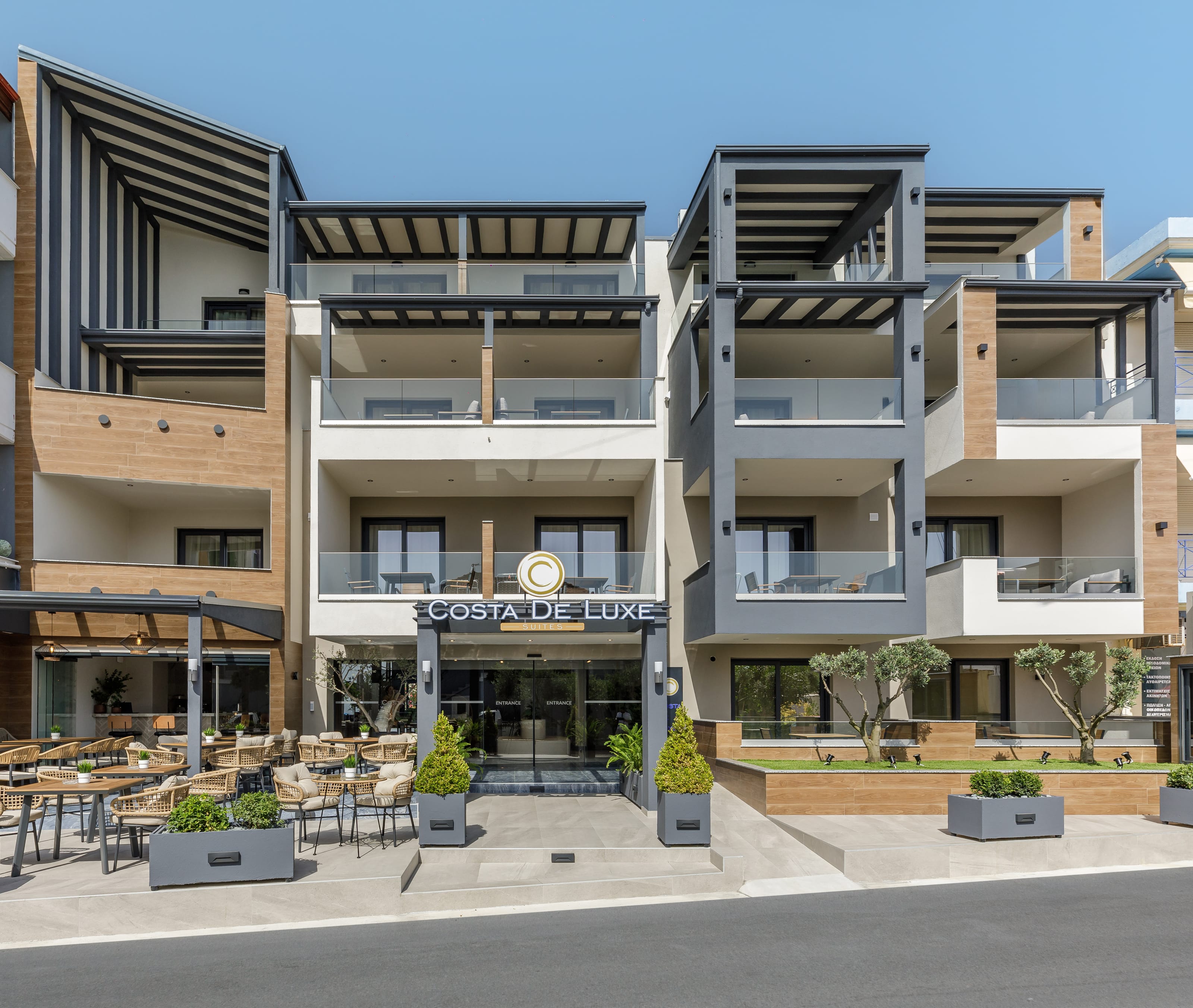 a building with a patio and tables