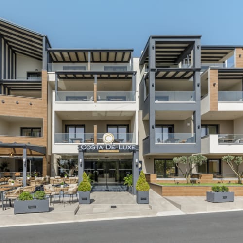 a building with a patio and tables