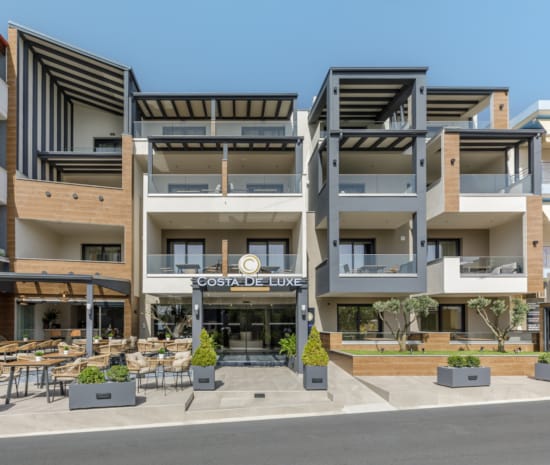 a building with a patio and tables