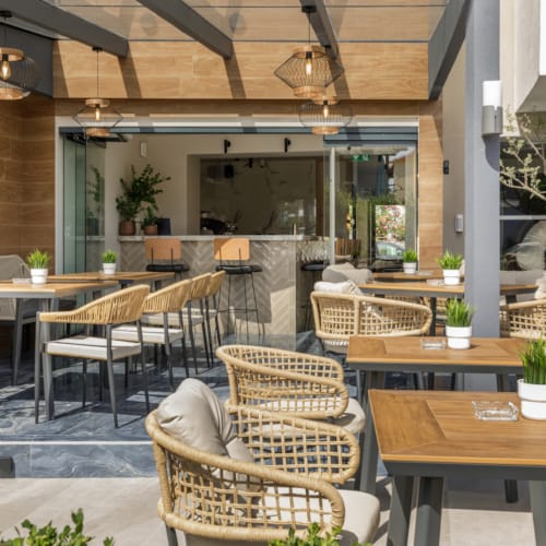 a room with tables and chairs