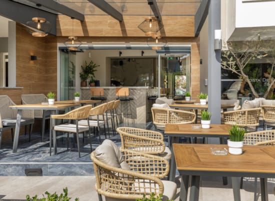 a room with tables and chairs