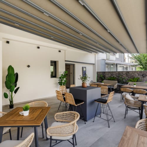 a room with tables and chairs