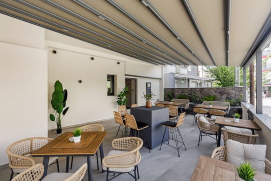 a room with tables and chairs