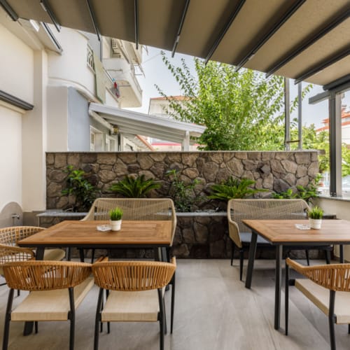 a room with tables and chairs