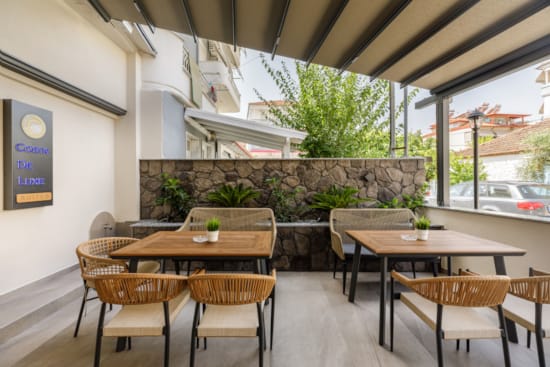 a room with tables and chairs