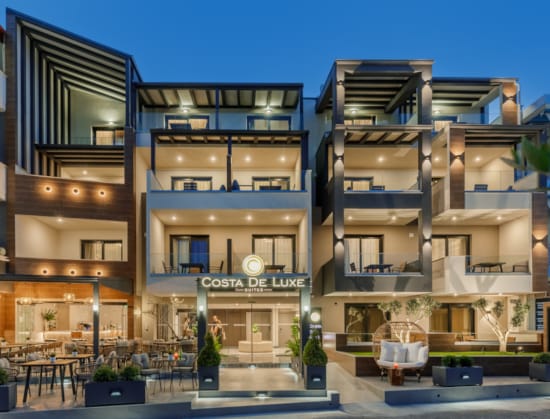 a building with a pool in front