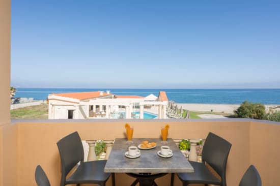a table with food on it by a beach
