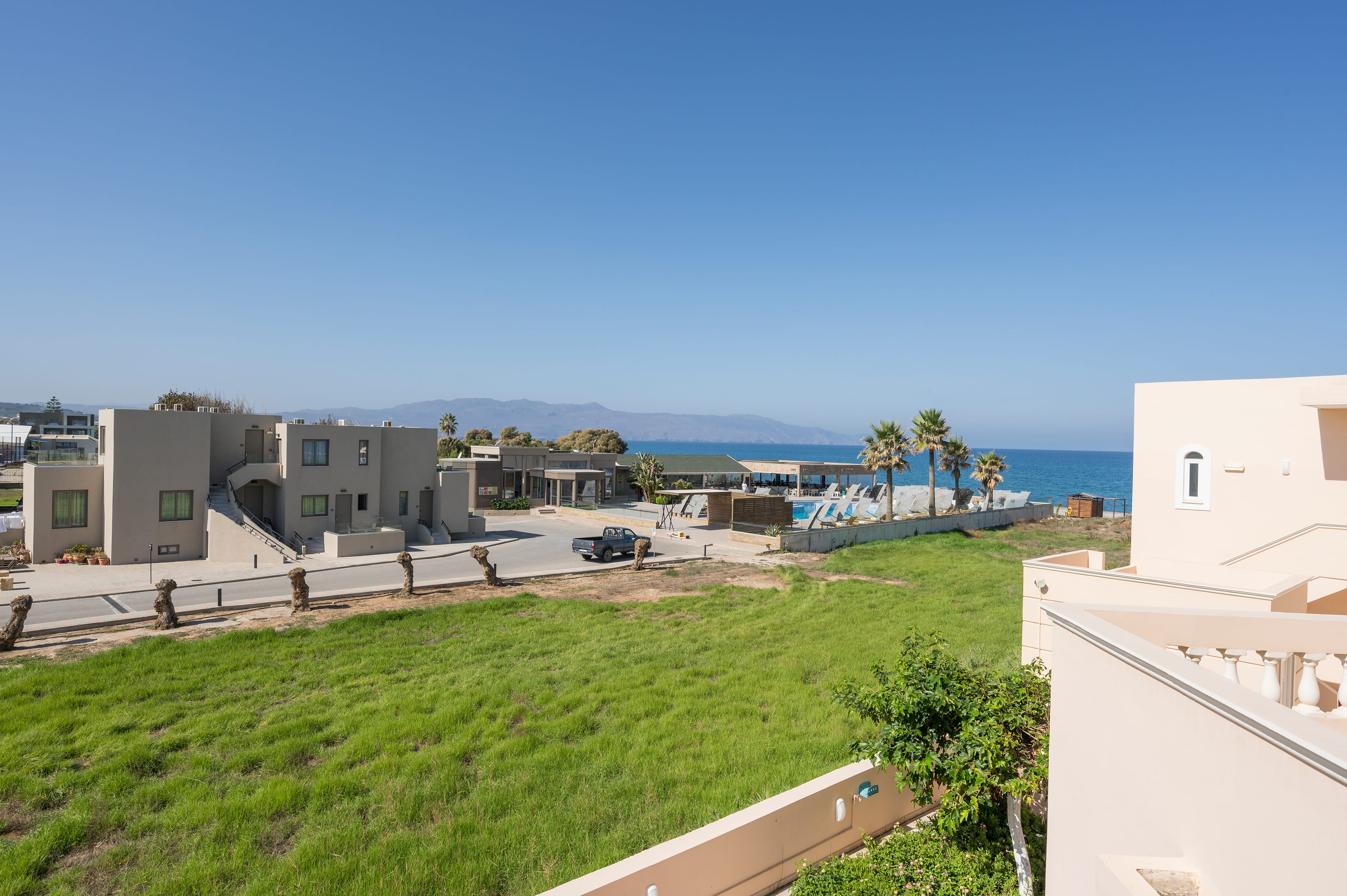 a group of buildings next to a body of water