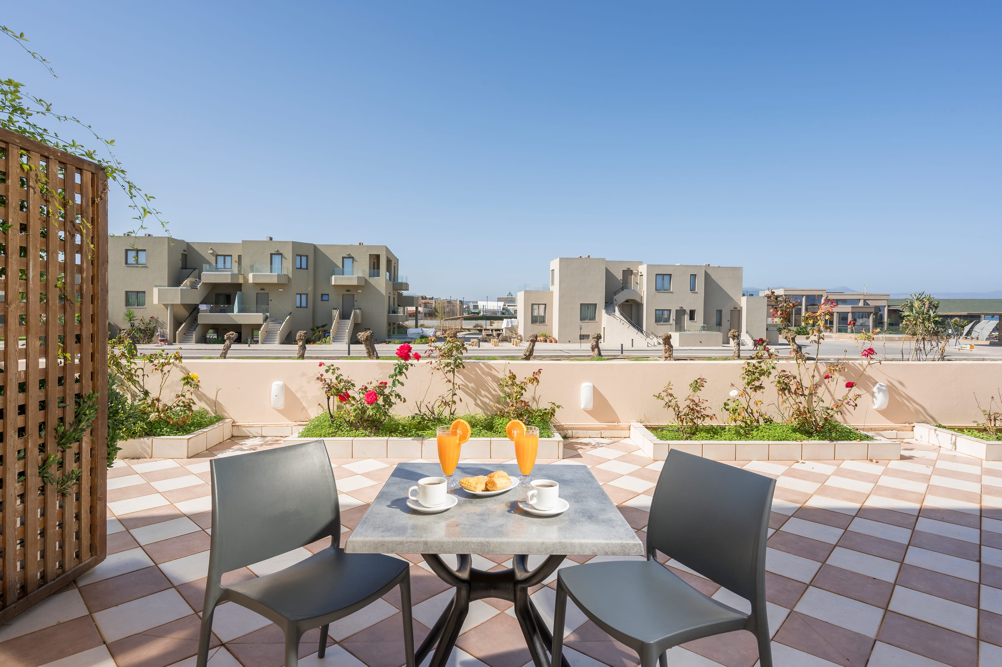 a table and chairs on a patio