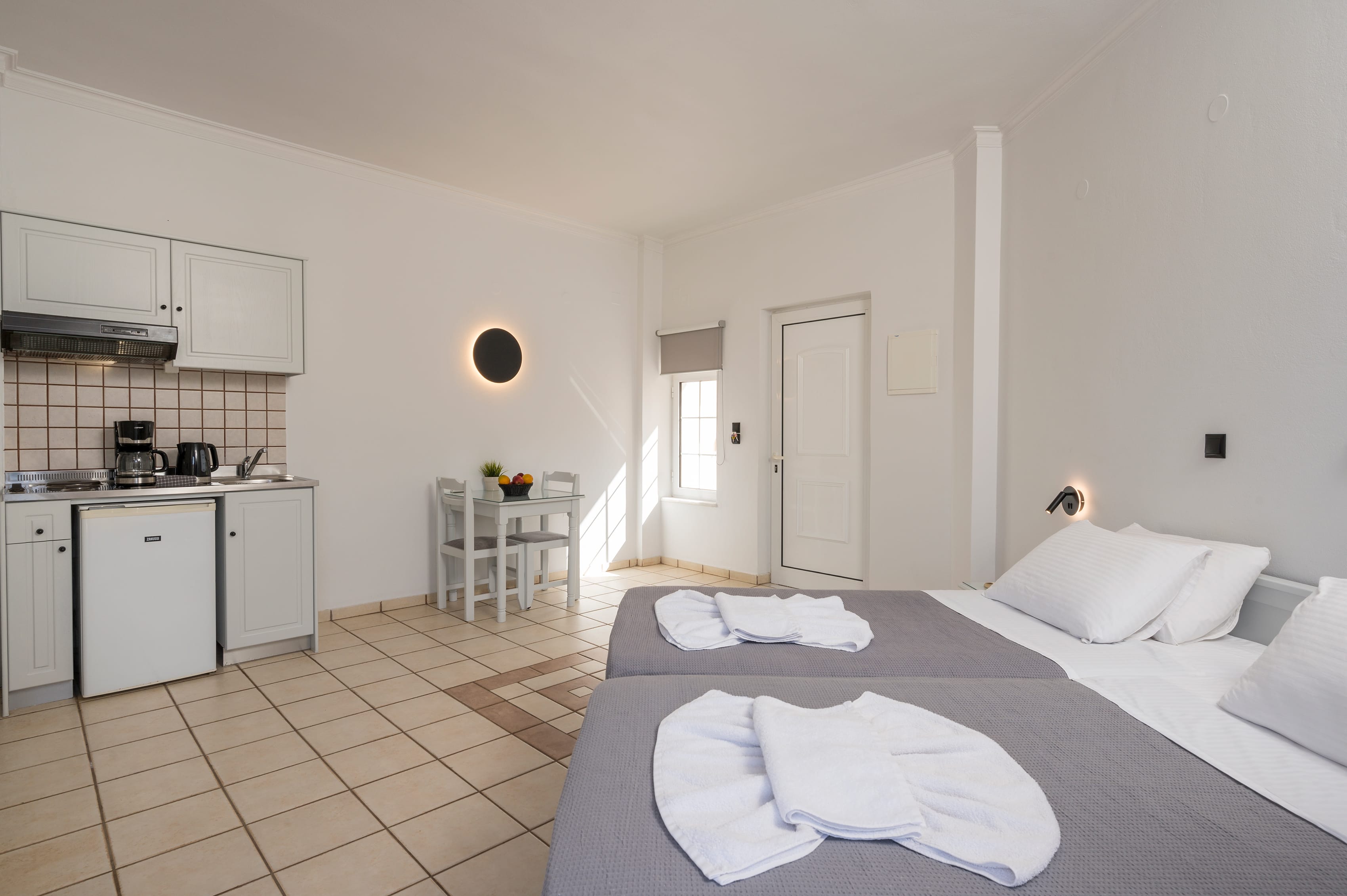 a room with a bed and a table