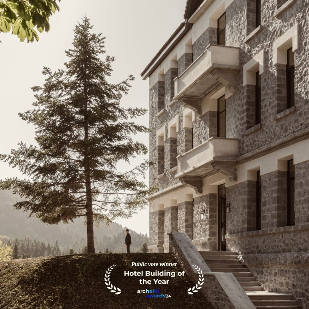 a tree next to a building