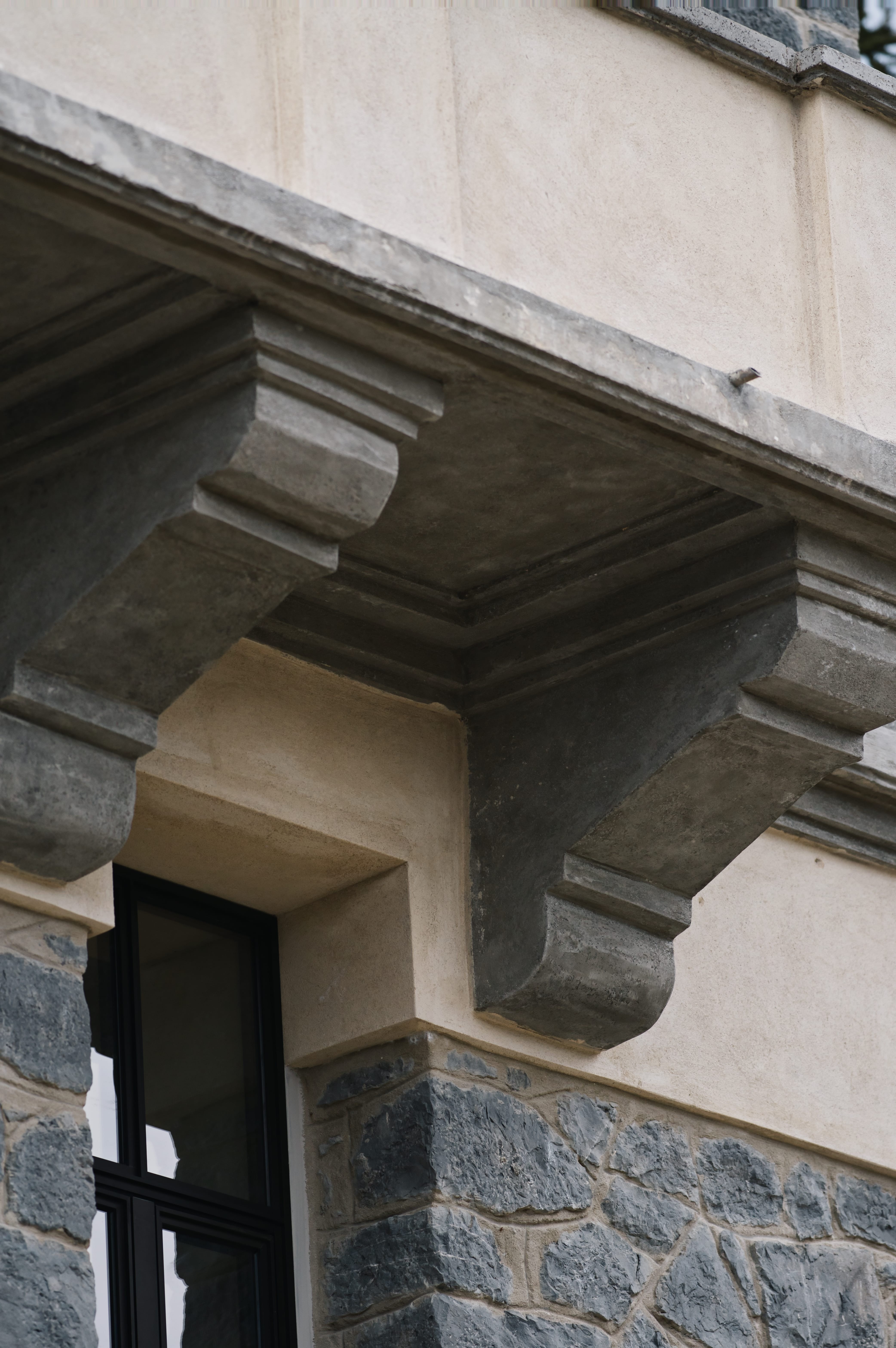 a stone building with a door