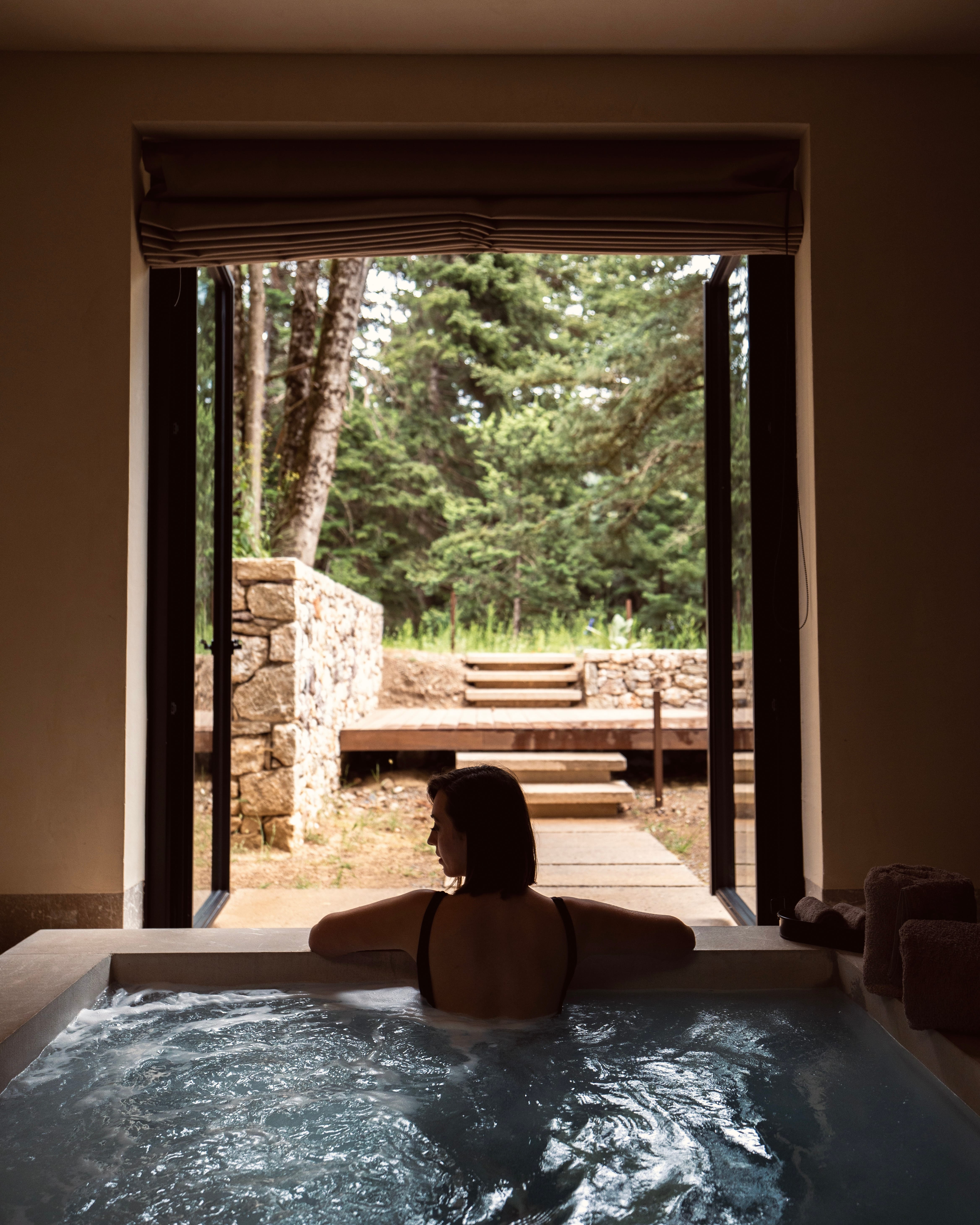 a person sitting in a pool