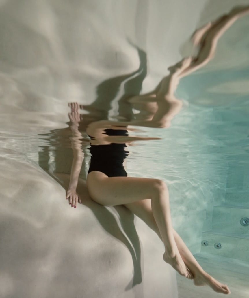 a person in a swimsuit underwater