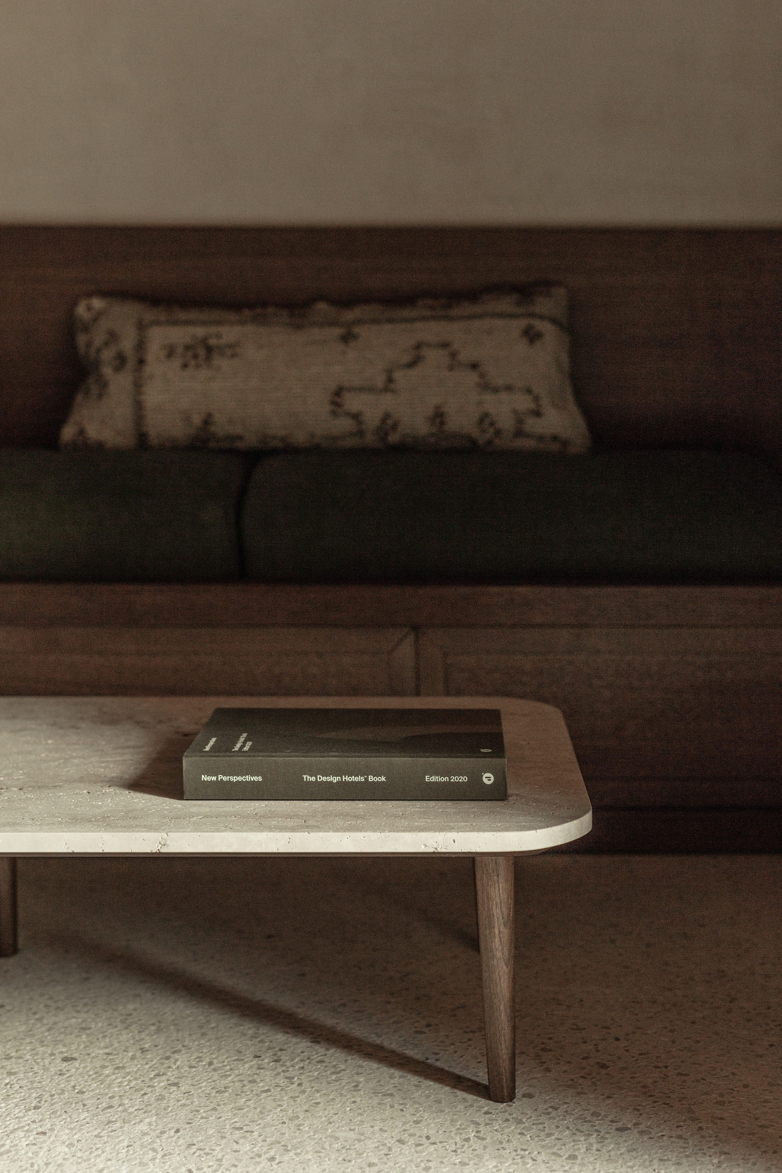 a rectangular electronic device on a wooden table