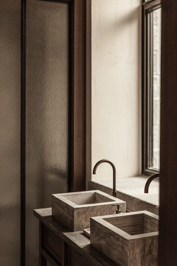 a bathroom with two sinks
