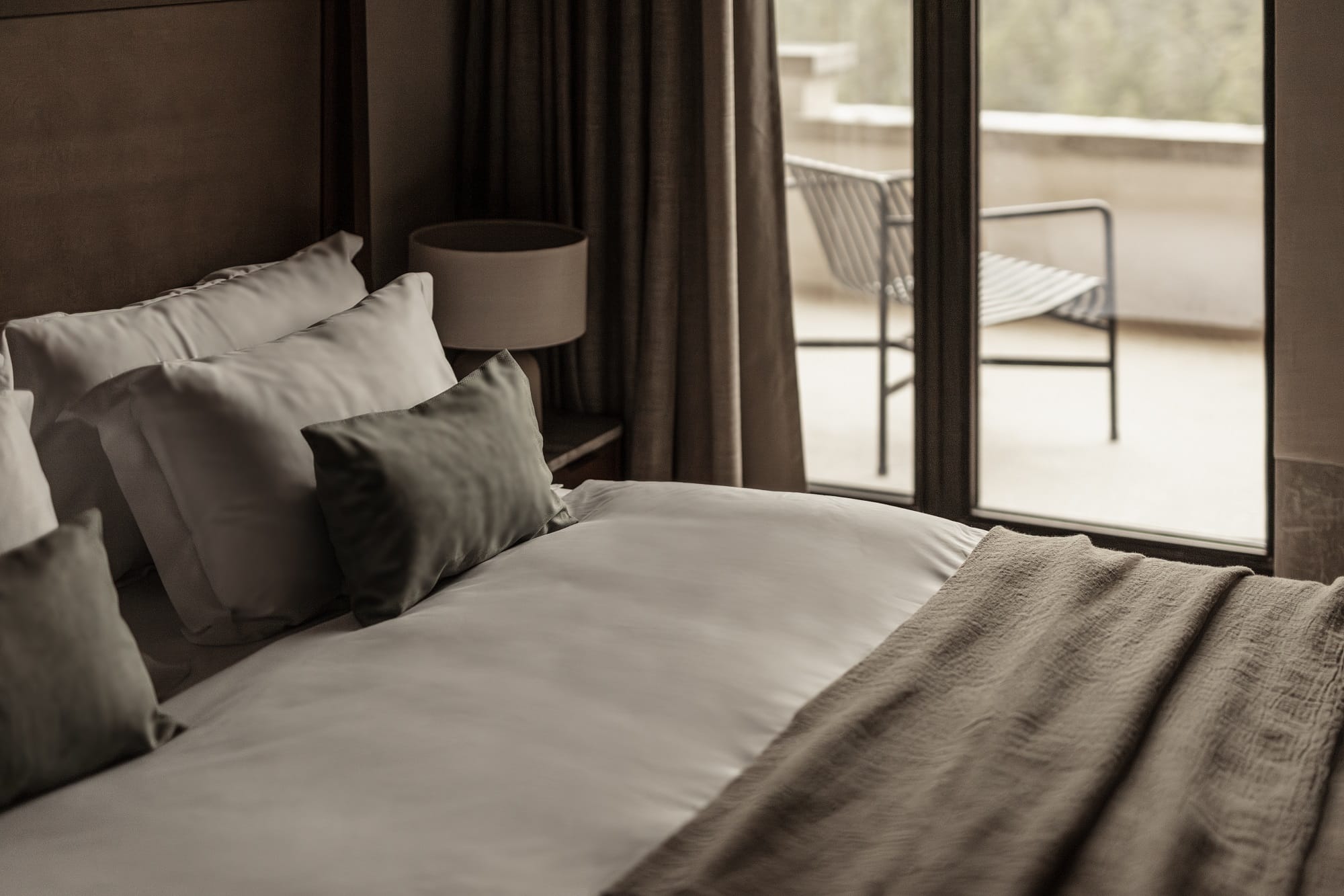 a bed with pillows