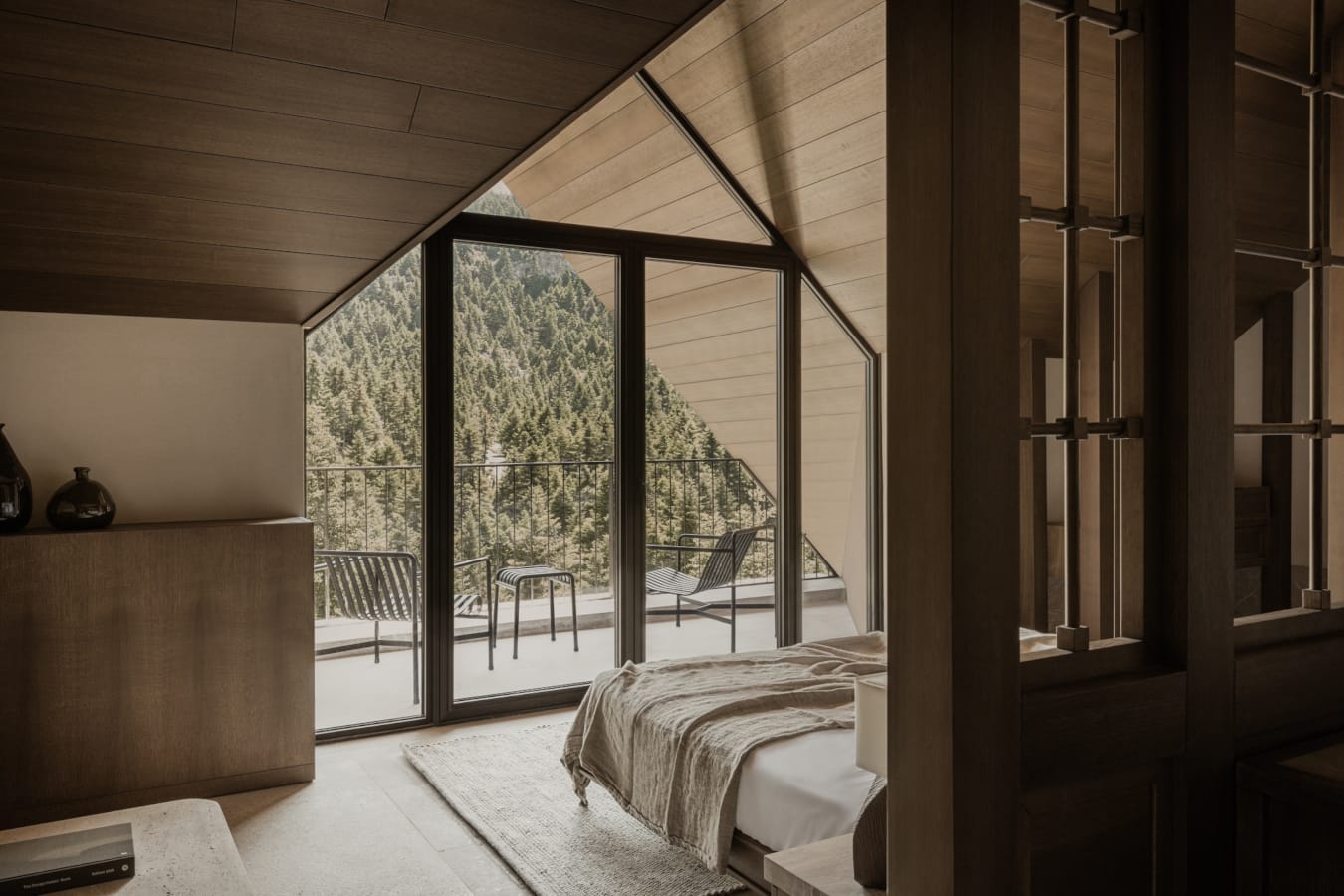 a bedroom with a large window