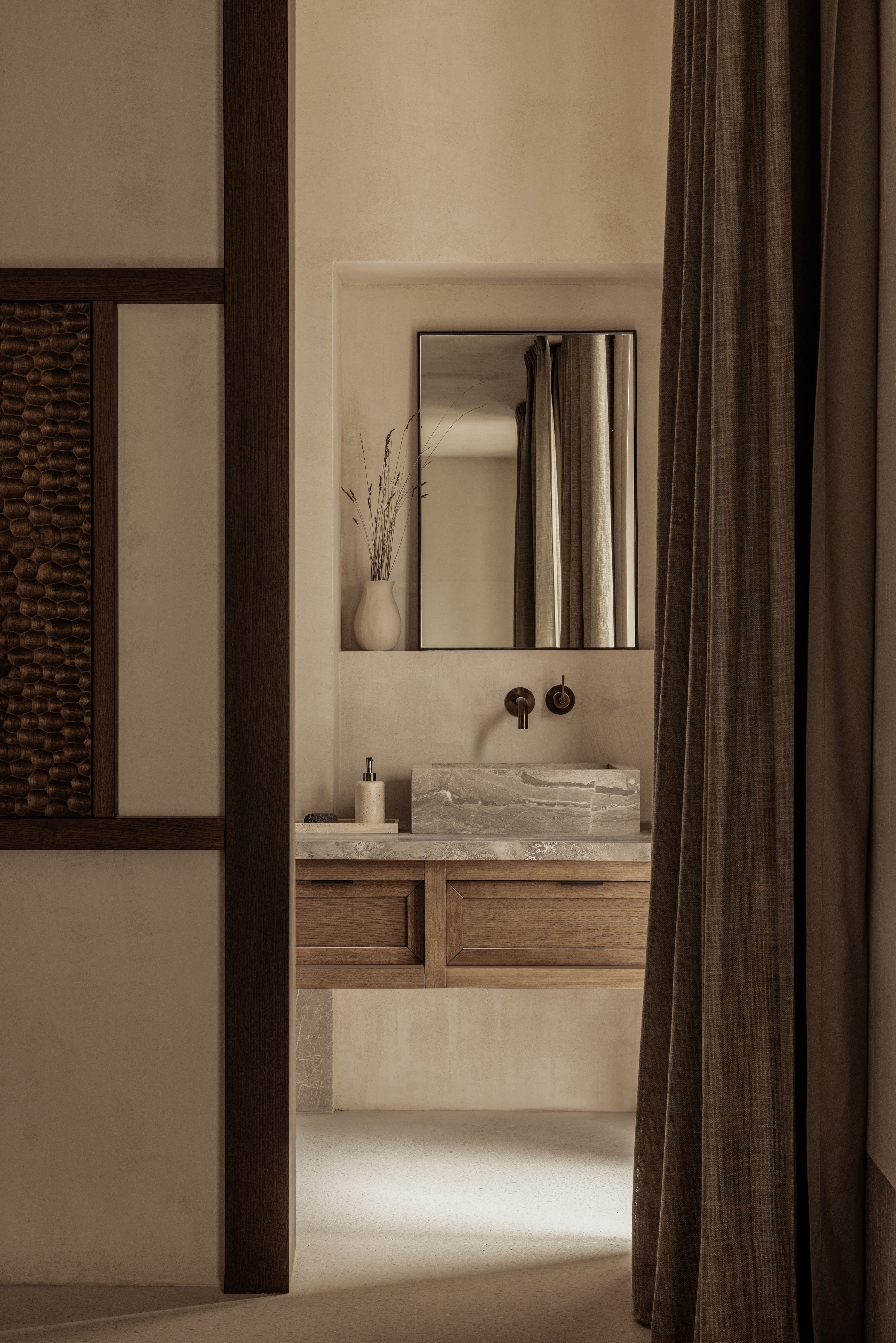 a bathroom with a sink and mirror