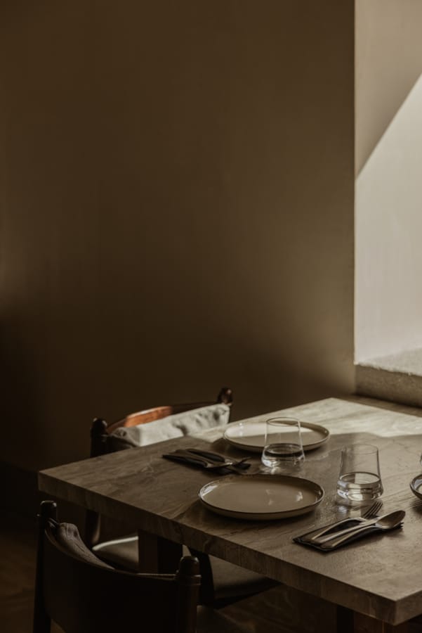 a table with plates and glasses on it