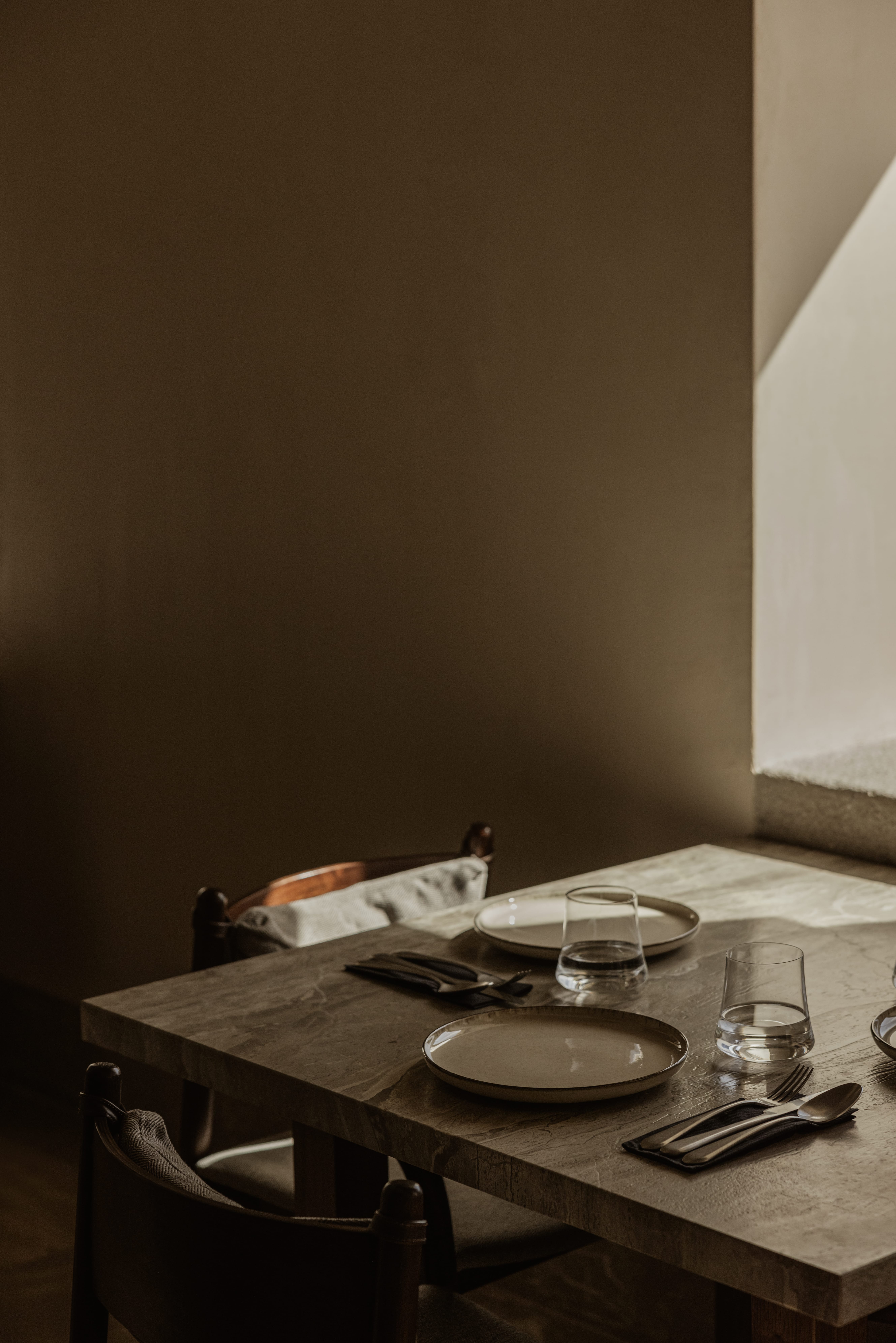 a table with plates and glasses on it