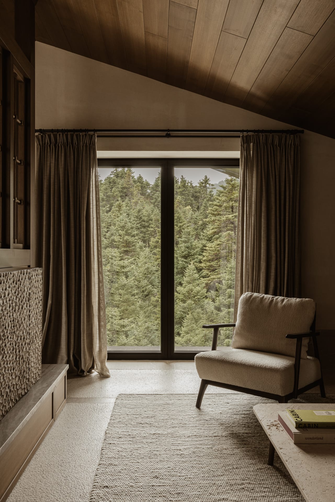 a room with a window and a chair