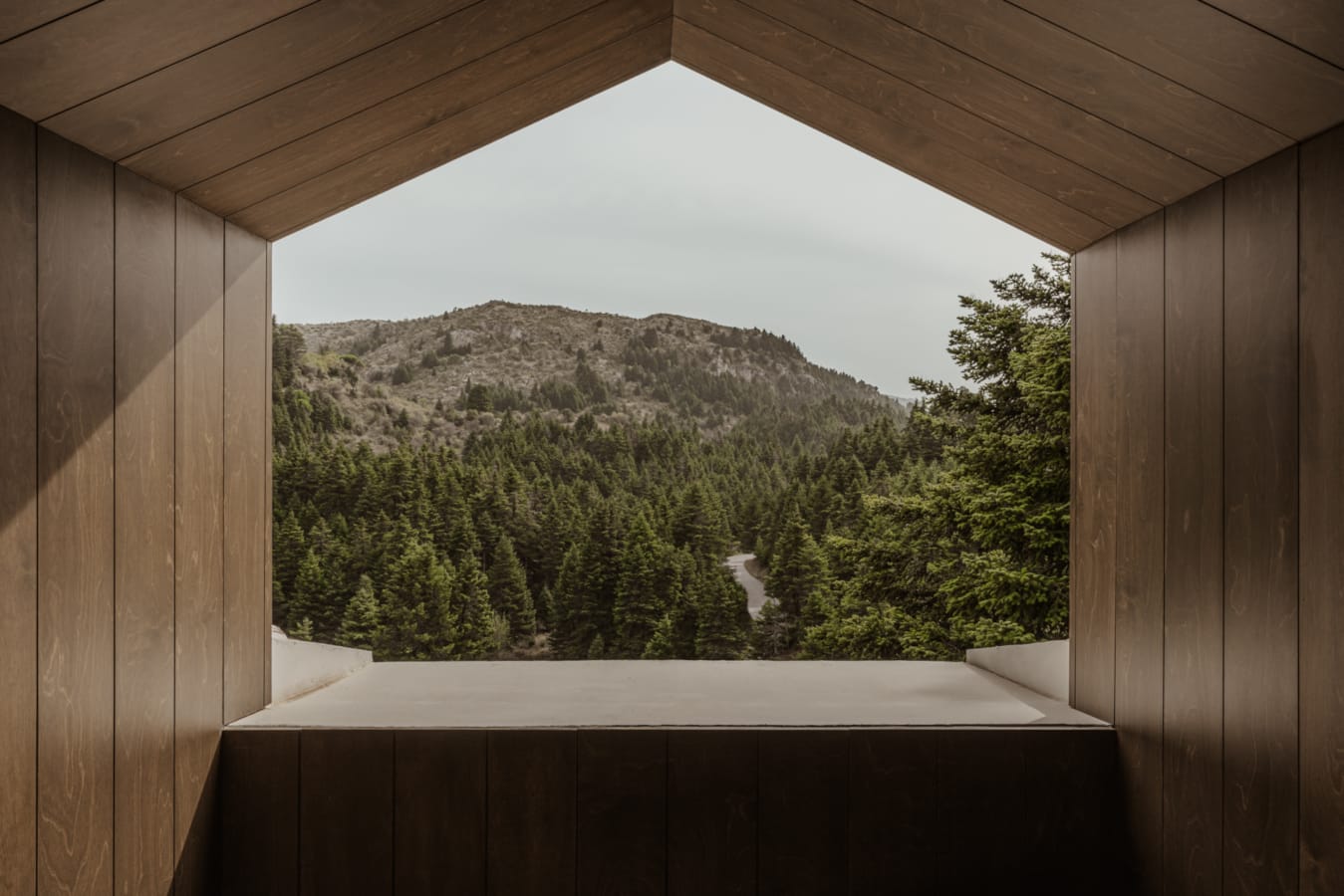 a view of a mountain from a window