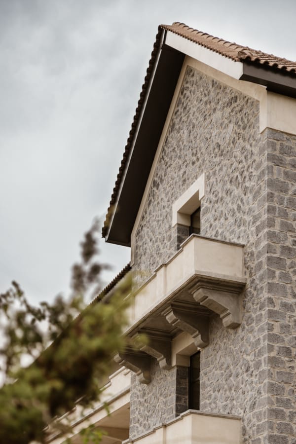 a building with a tree in the front
