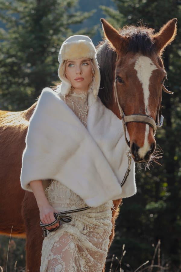 a person sitting on a horse