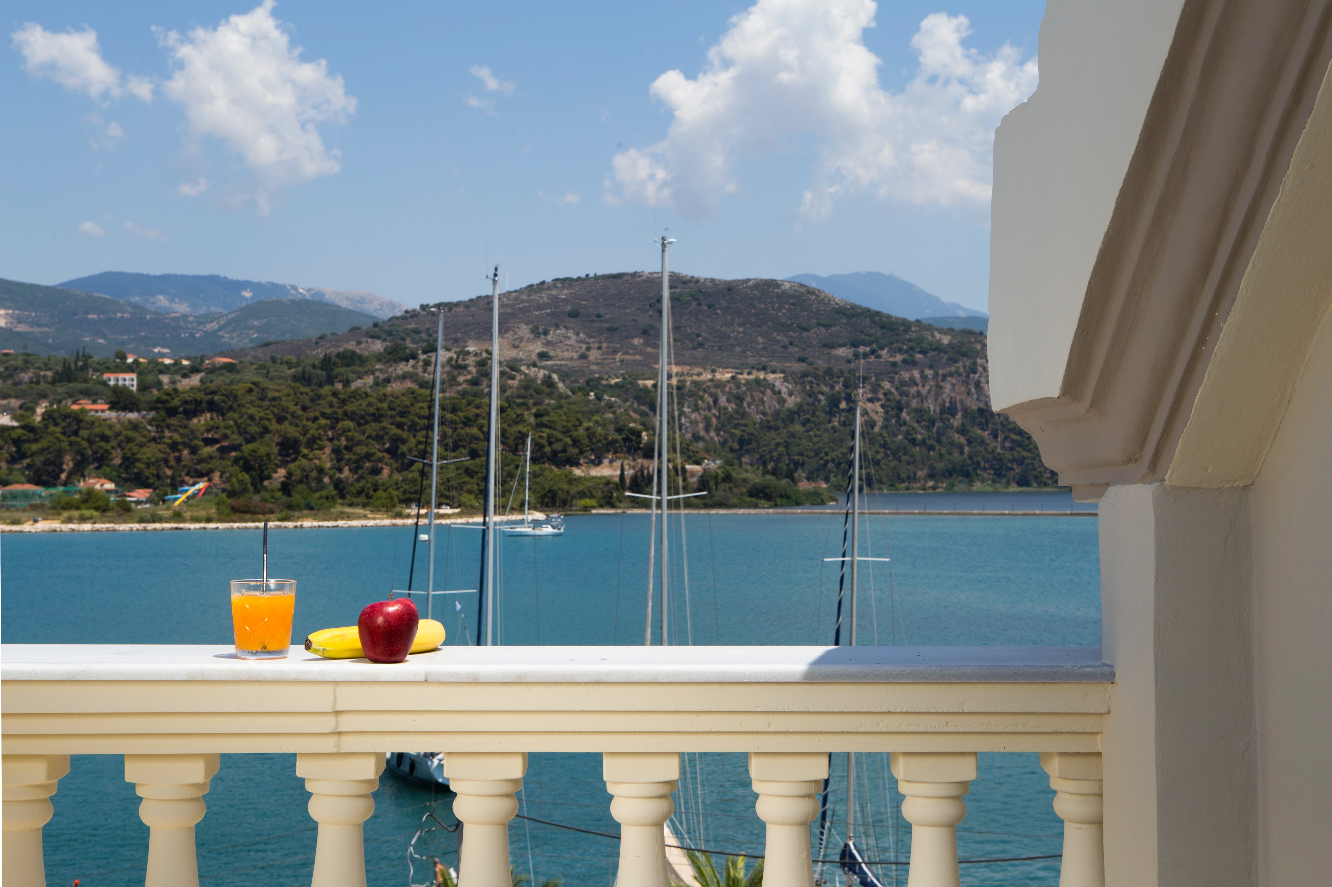 a balcony overlooking a body of water