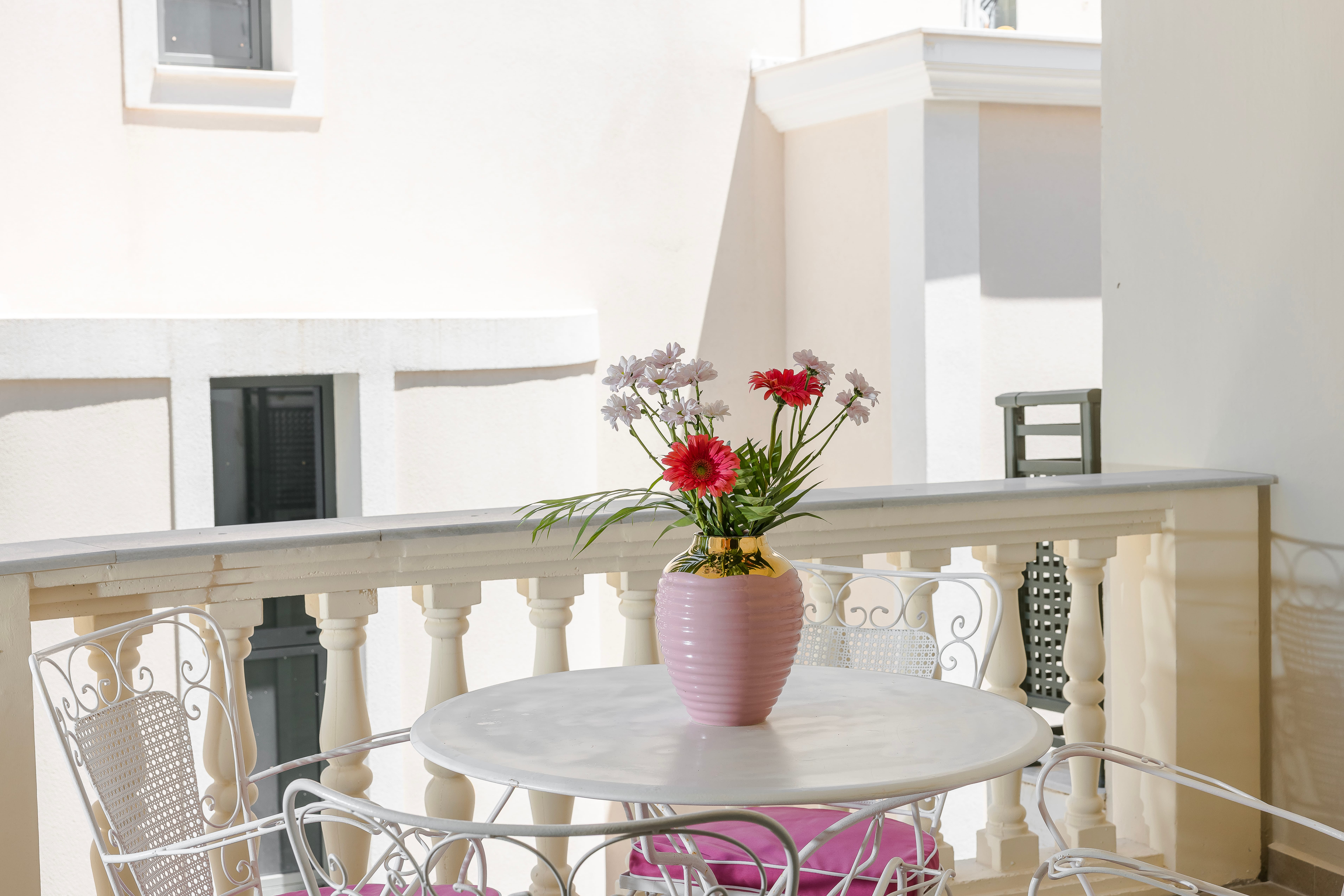 a table with a vase of flowers