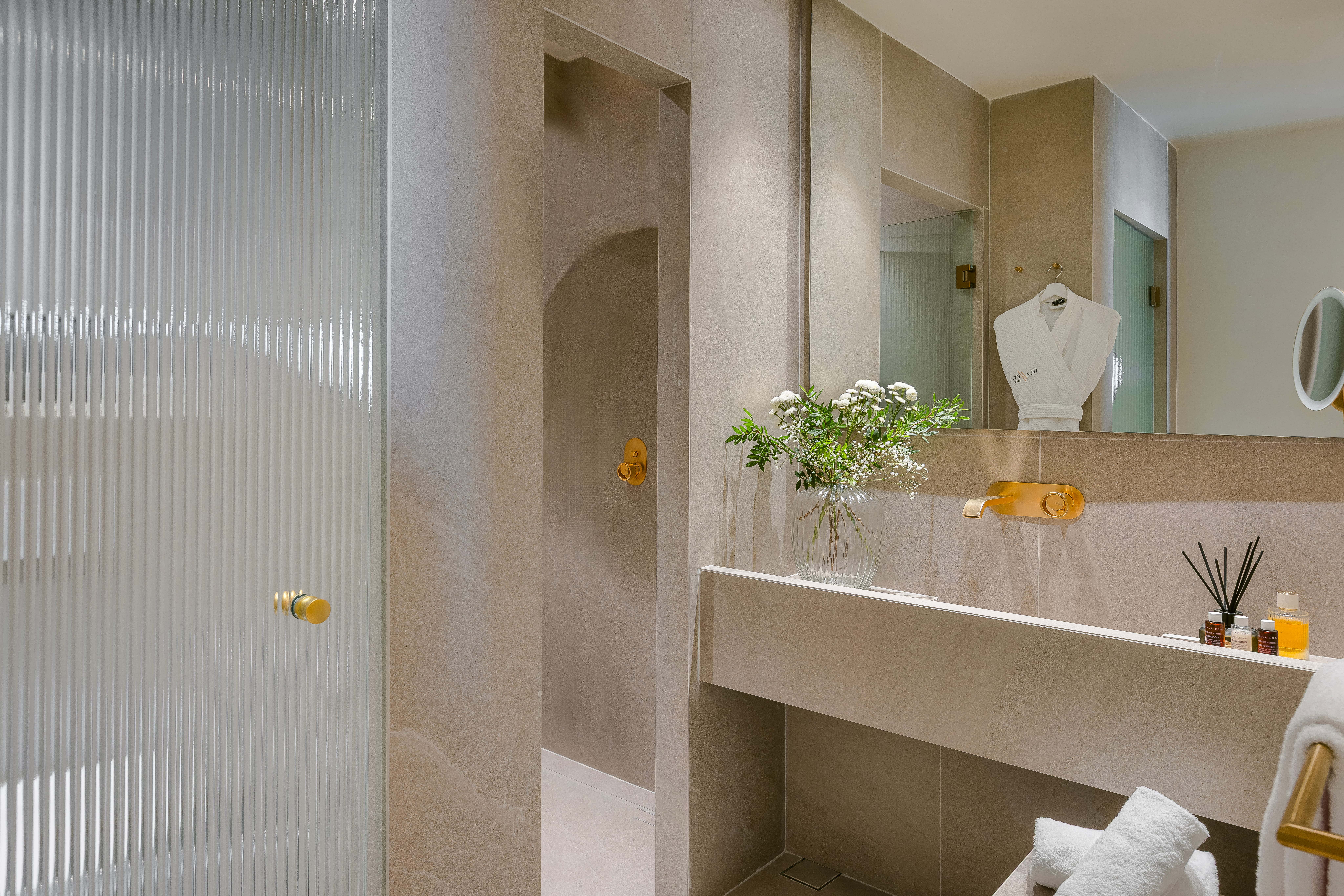 a bathroom with a marble countertop
