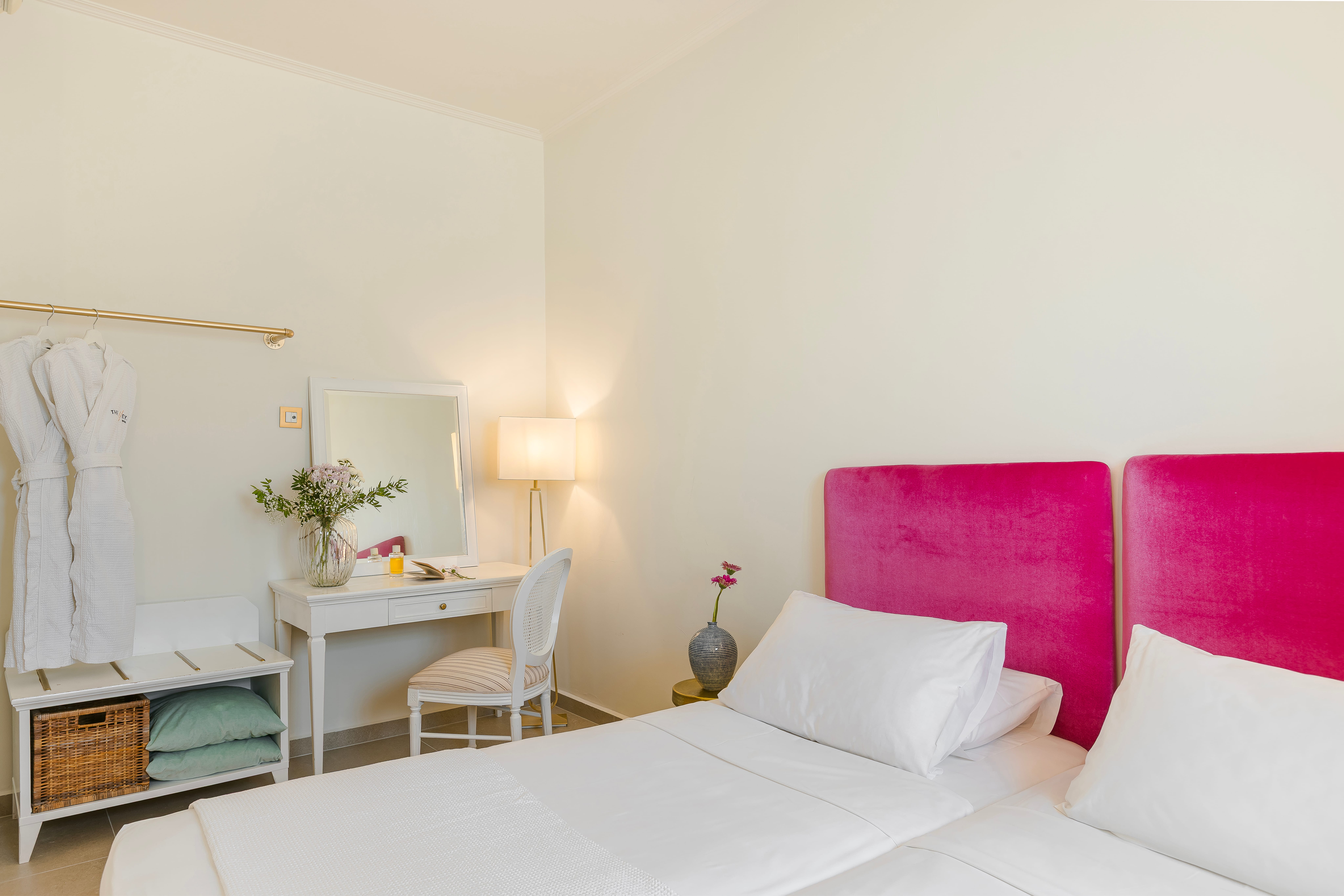 a bedroom with a bed and a desk