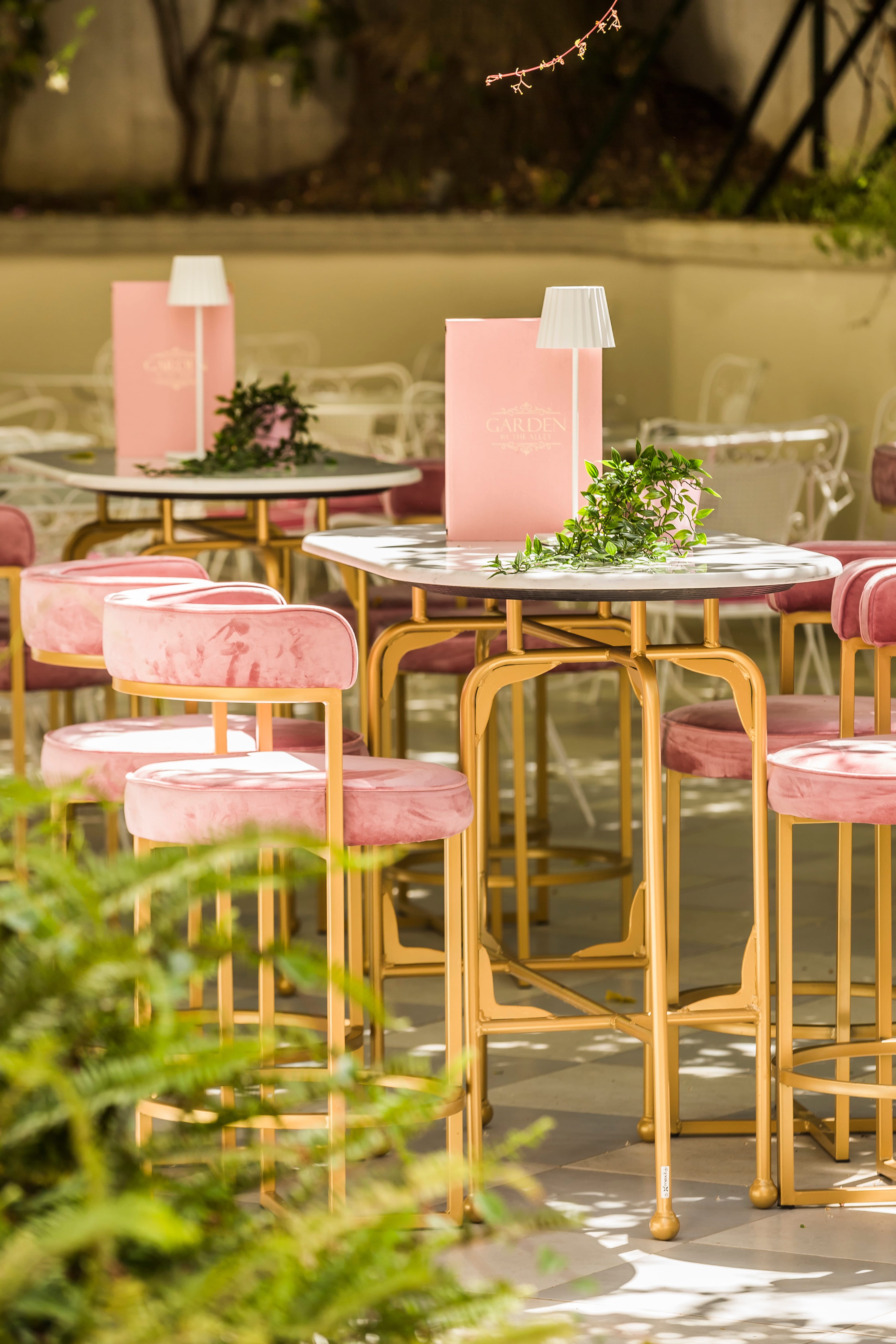 a group of tables and chairs outside
