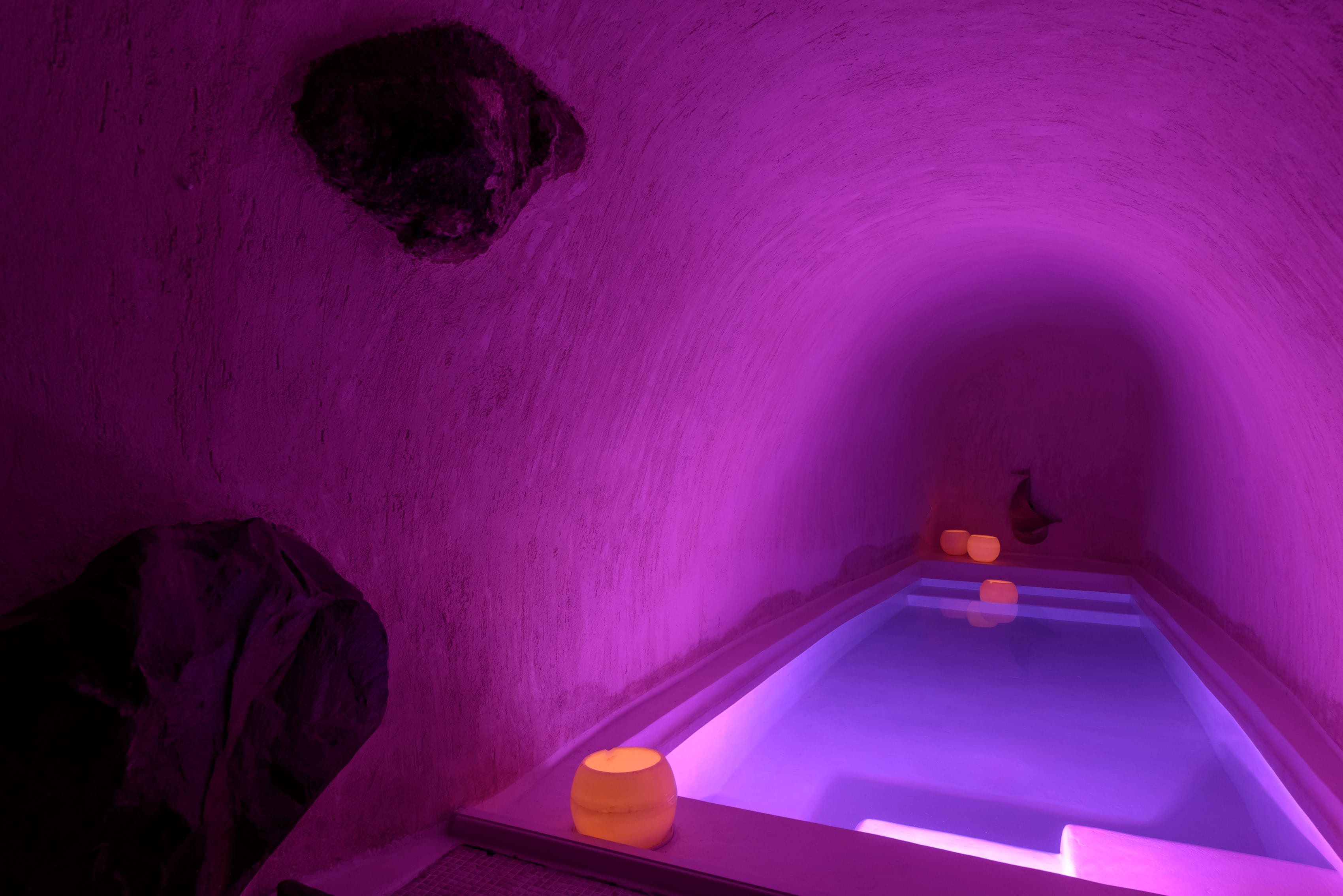 a person sitting in a dark room