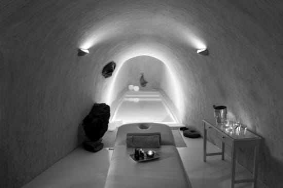 a person sitting on a bed