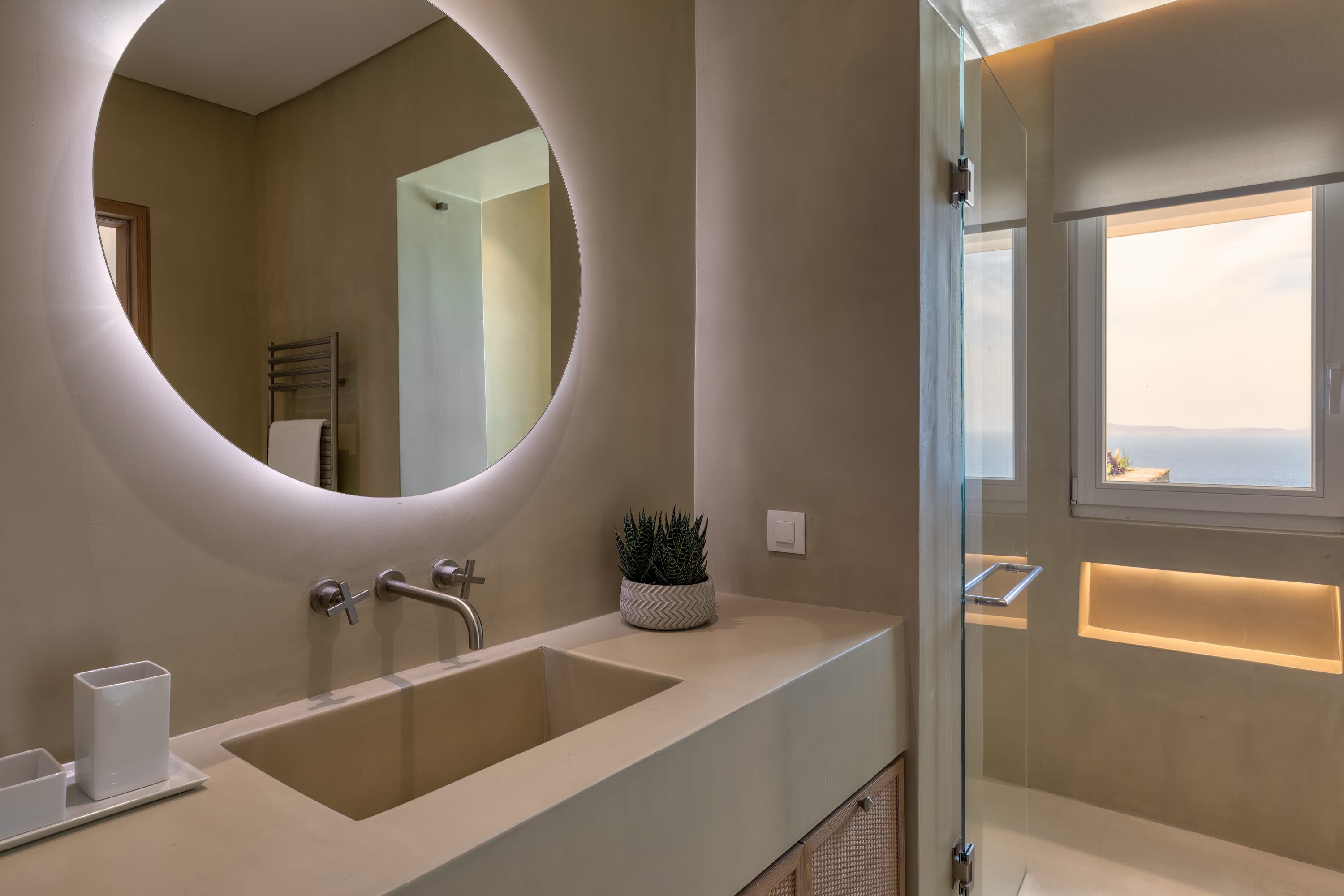 a bathroom with a large mirror