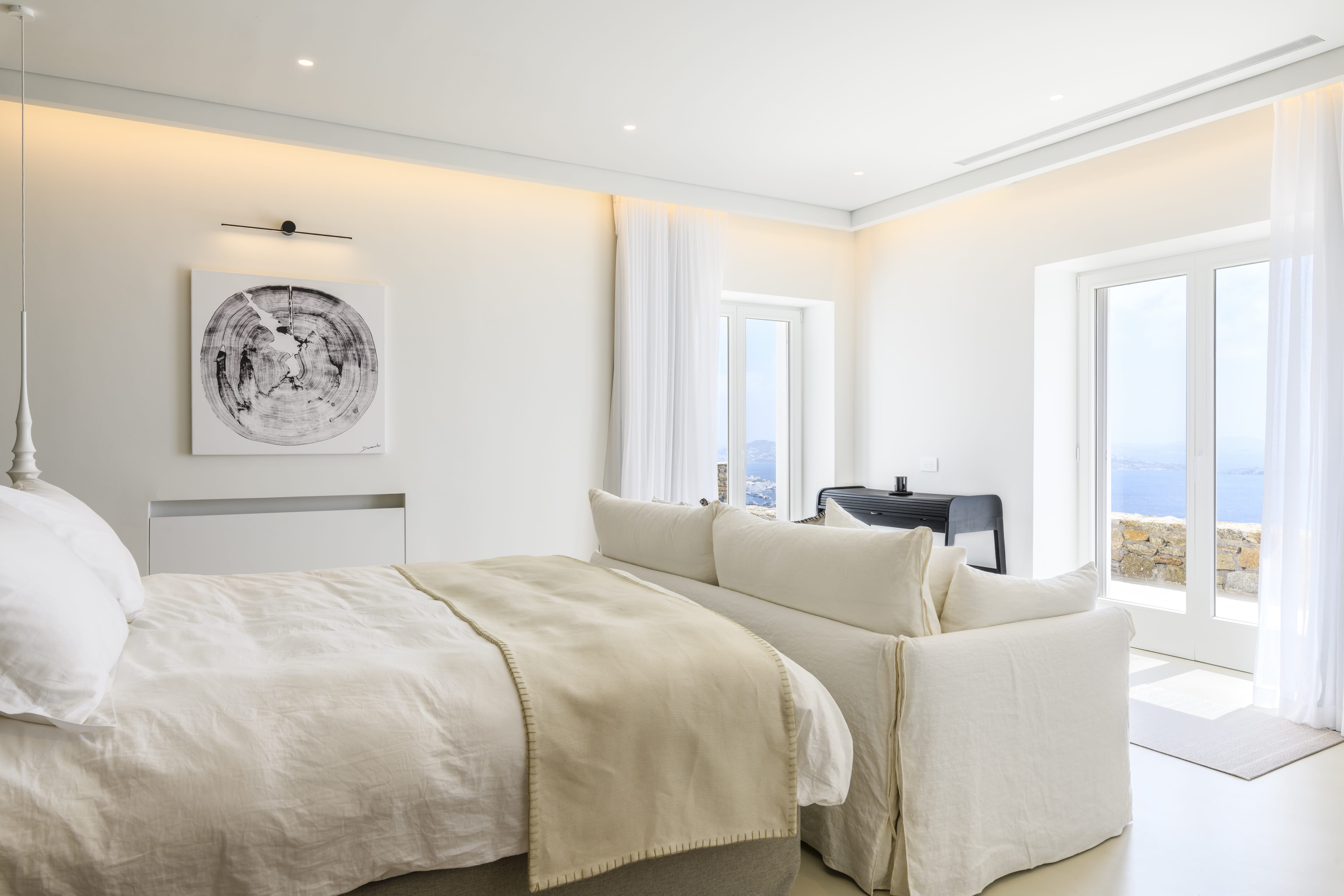 a large bedroom with a large bed